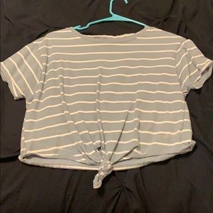 Blue and white striped crop top tied with a knot